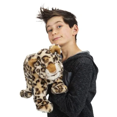 A "Baby Leopard" hand puppet by Folkmanis on a boy's arm
