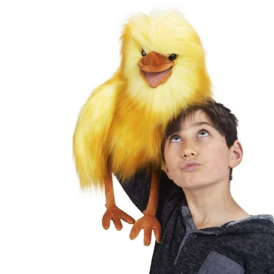 Menino a brincar com a marioneta de mão «Drôle d'oiseau» - Funny Bird® da marca Folkmanis Menino a brincar com a marioneta de mão «Drôle d'oiseau» - Funny Bird® da marca Folkmanis