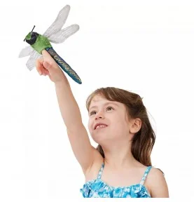 A young girl playing with a Folkmanis Mini Dragonfly puppet
