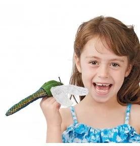 A young girl playing with a Mini Dragonfly puppet by Folkmanis
