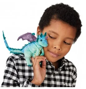 Boy playing with a Folkmanis Mini Dragon puppet